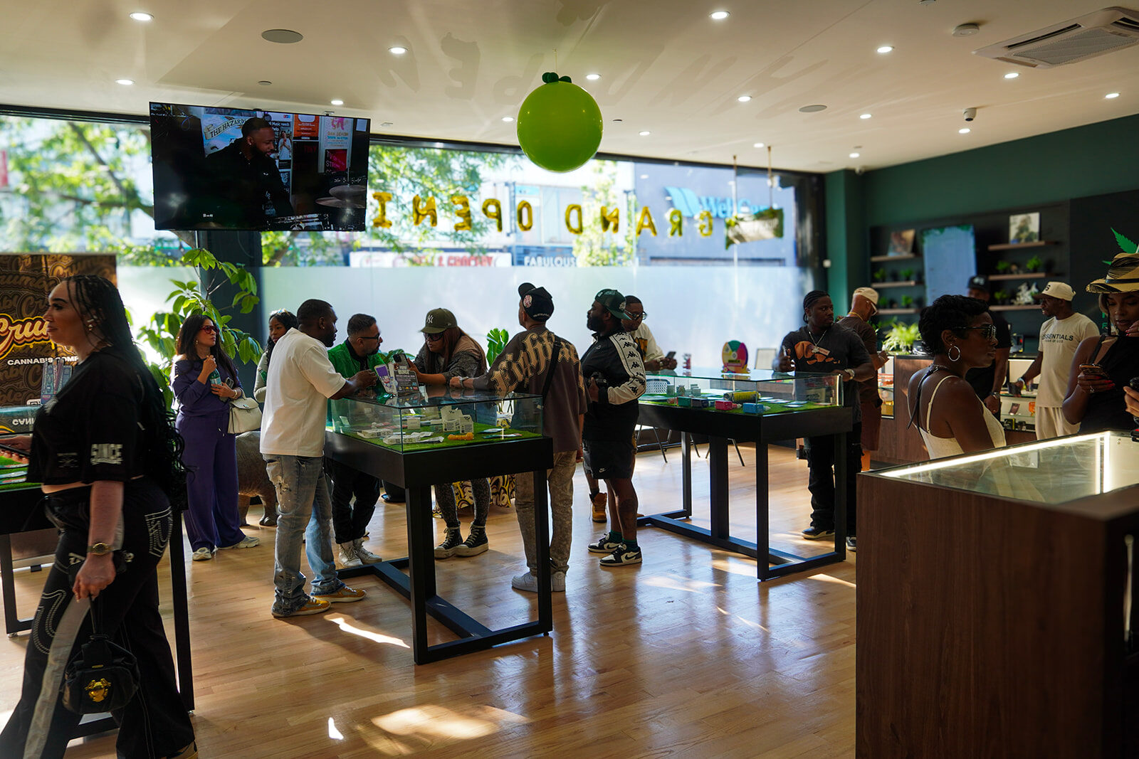 Customers shopping at Jungle Kingdom Flower dispensary during the Bed-Stuy grand opening